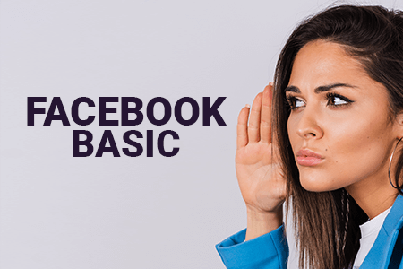 Młoda ciemnowłosa kobieta spogląda z zaciekawieniem w prawo na napis Facebook Basic.